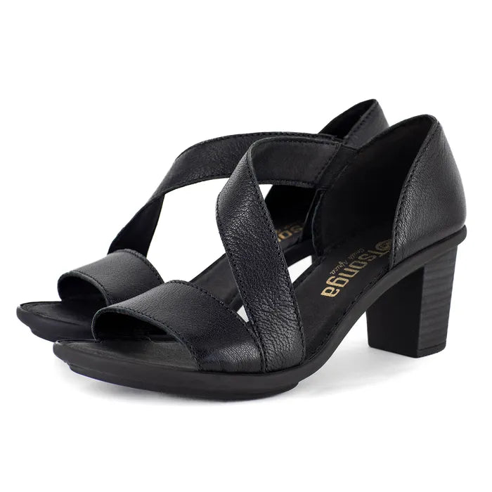 Black heeled sandals with criss-cross straps on a white background