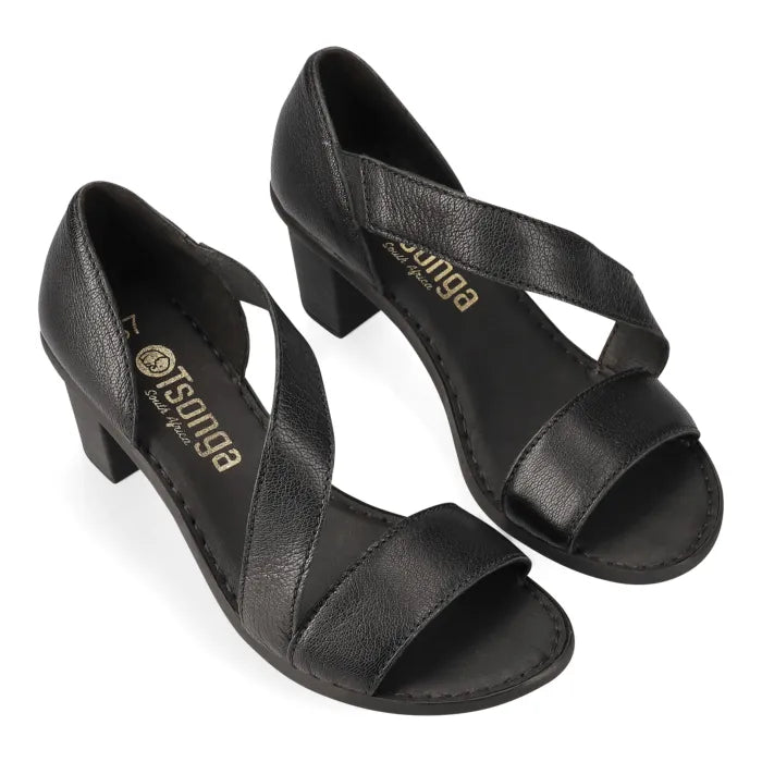 Pair of black high-heeled sandals with 'Tsonga' branding on a white background