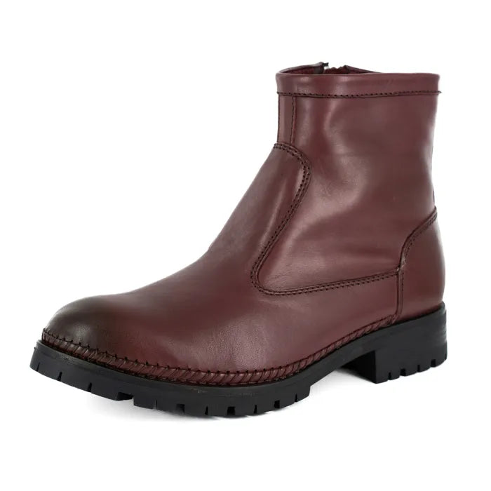 Maroon leather boot on a white background