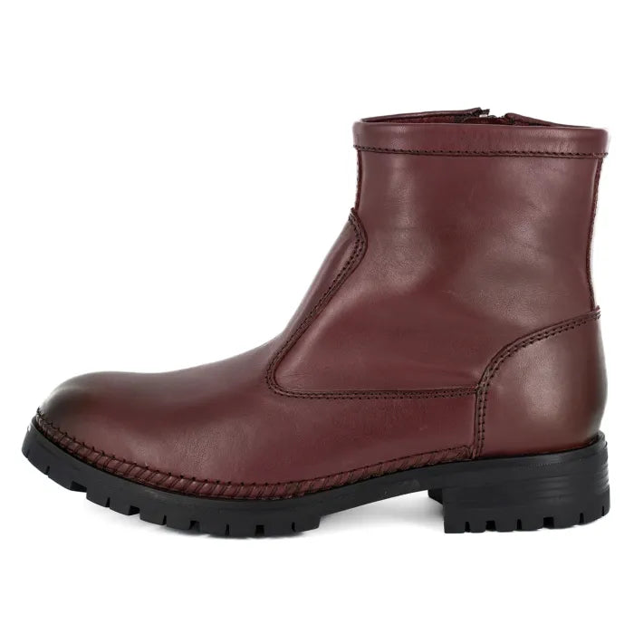 Maroon leather boot on a white background
