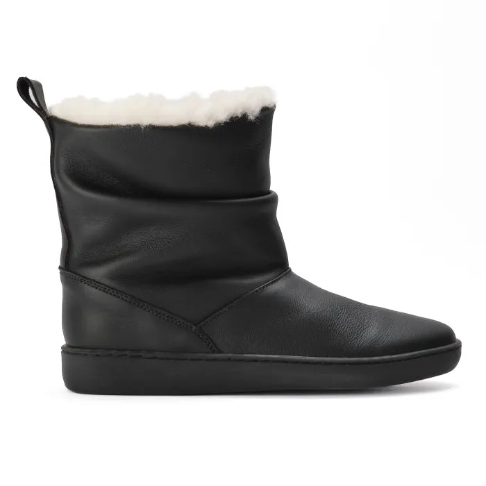Black ankle boot with white wool lining on a white background