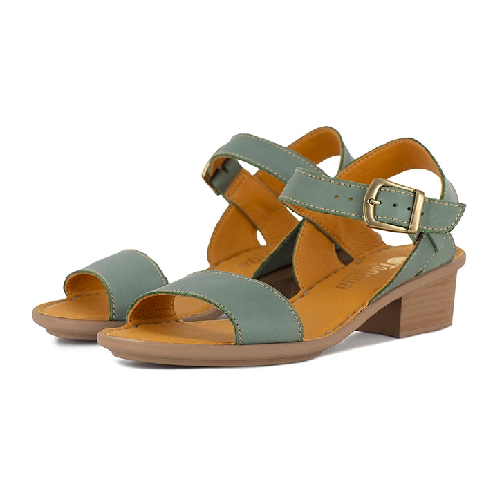 Pair of green sandals with a gold buckle on a white background