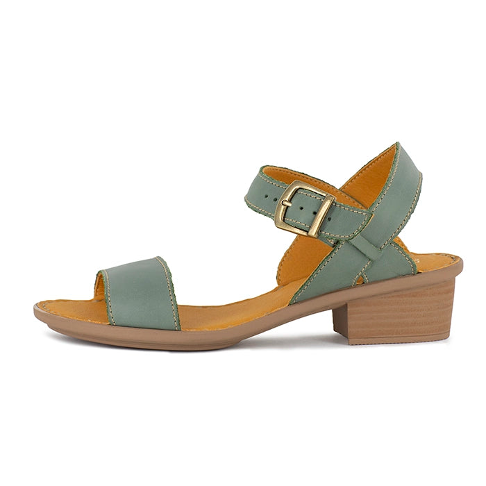 Green sandal with beige block heel on a white background