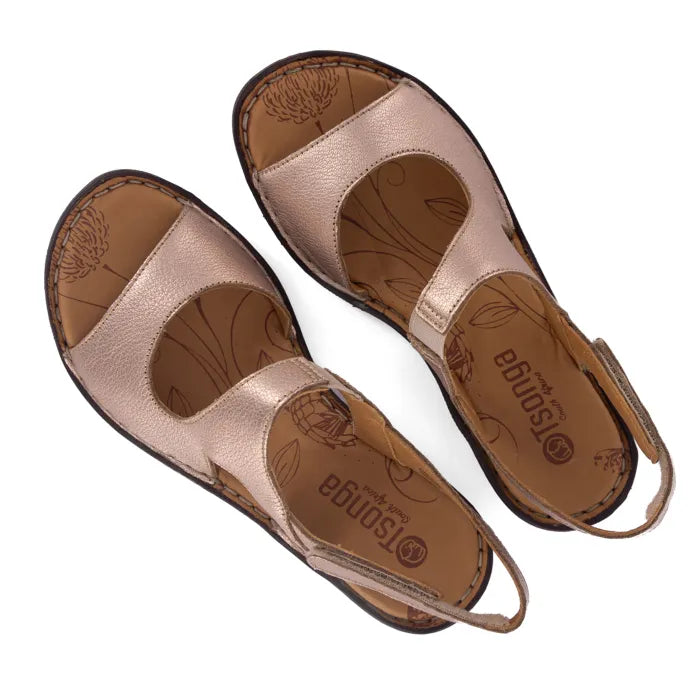 Women’s rose gold metallic low heel slingback sandals.