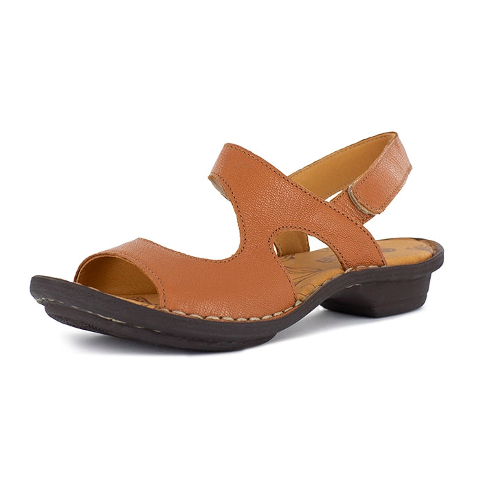 Tan sandal with a black sole on a white background