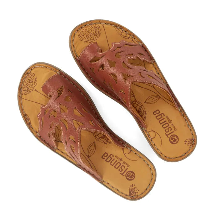 Pair of brown sandals with cut-out design on a white background