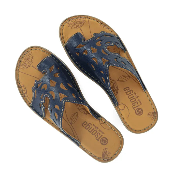 Pair of blue sandals with tan soles on a white background