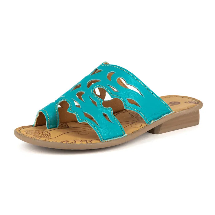 Turquoise sandal with cut-out design on a white background