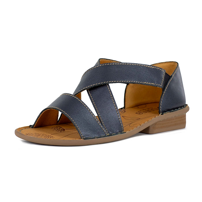 Black sandal with criss-cross straps on a white background