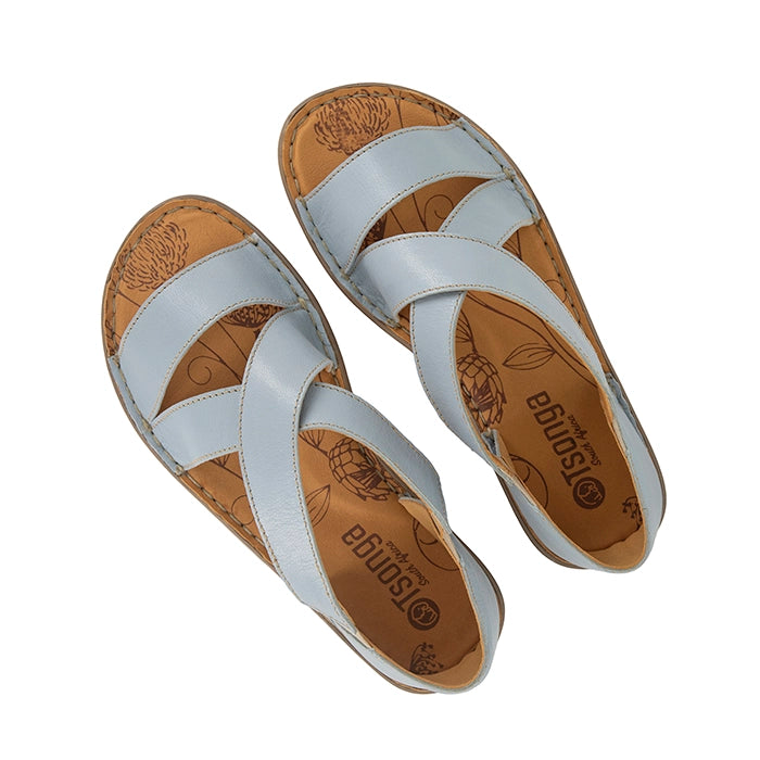 Light blue sandal with beige sole on a white background