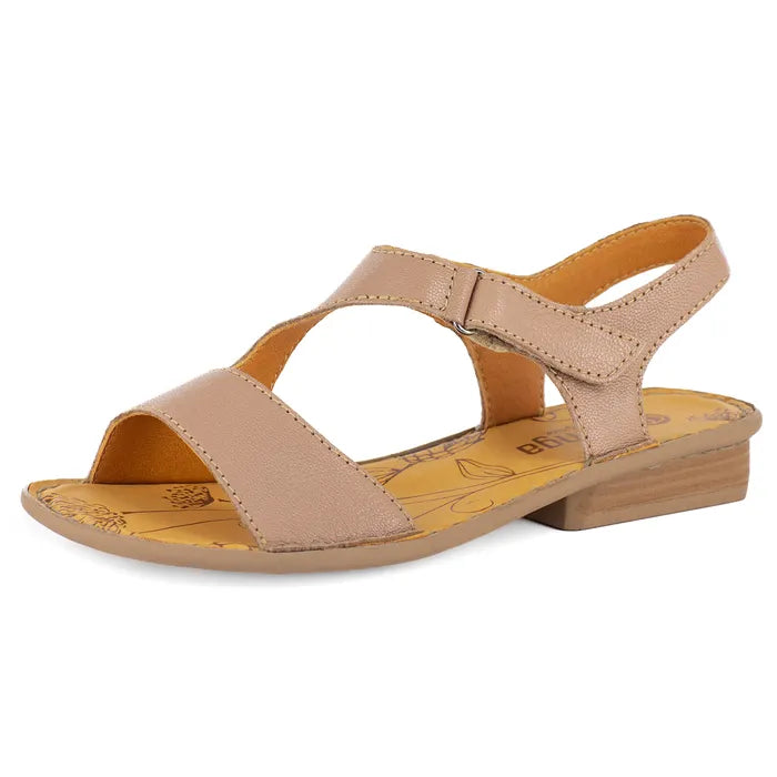 Beige sandal with a block heel on a white background