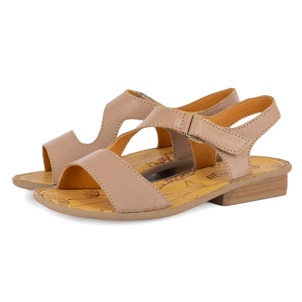 Pair of beige sandals on a white background