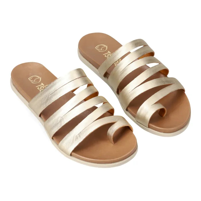 A pair of metallic gold strappy slide sandals with a tan footbed, shown on a plain white background.