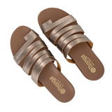 Pair of brown sandals with metallic straps on a white background