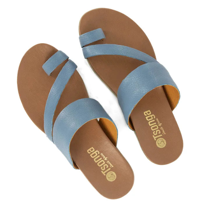 Pair of sandals with blue straps and off white soles on a white background