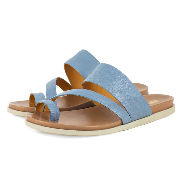 Pair of light blue sandals with off white soles on a white background