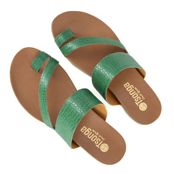 Pair of sandals with green straps and brown soles on a white background