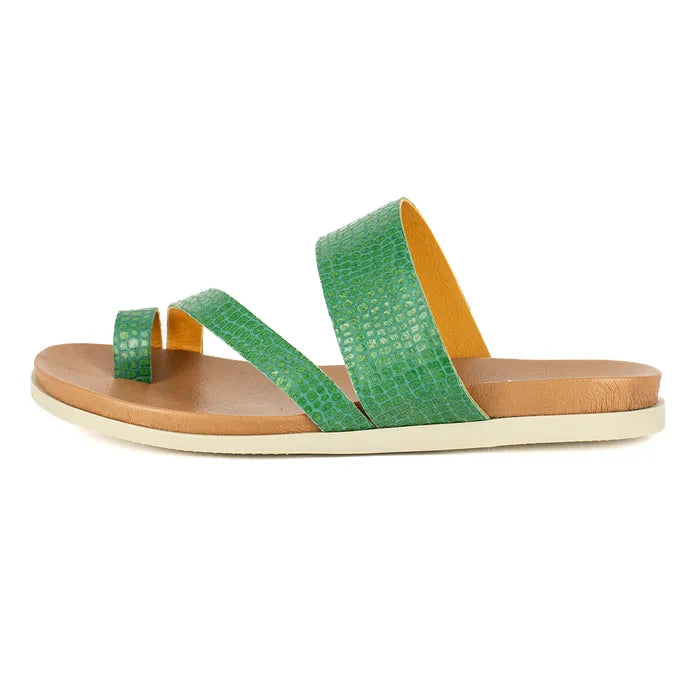 Green sandal with off-white sole on a white background