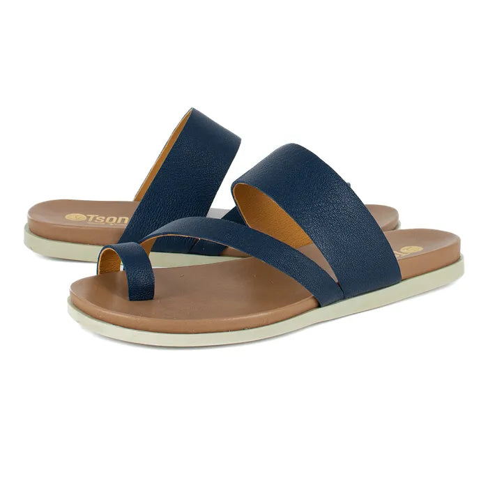 Navy sandals with brown soles on a white background