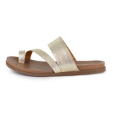 Gold sandal with a tan sole on a white background