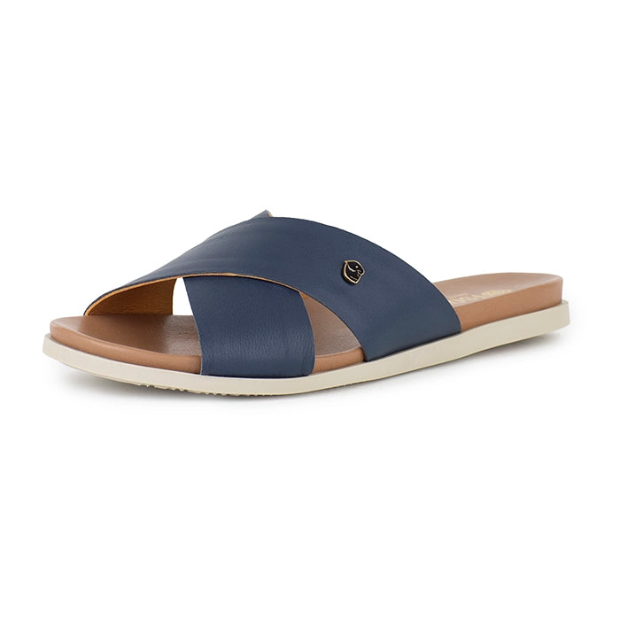 Navy sandal with a off-white sole on a white background
