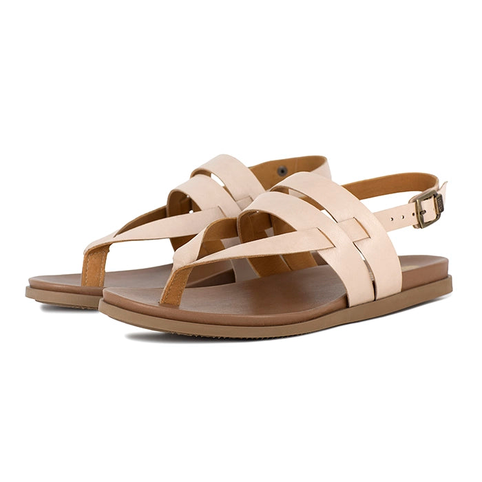 Pink sandals with brown soles on a white background