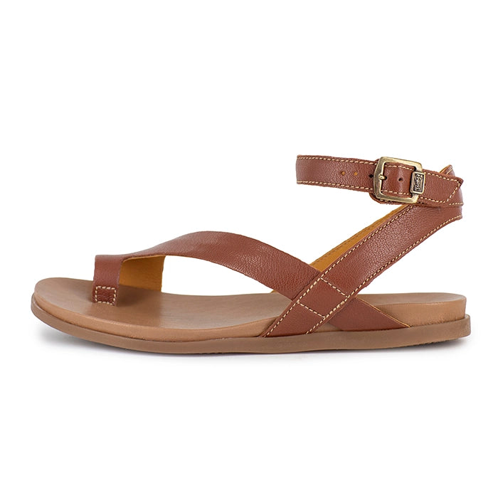 Brown sandal with a strap and buckle on a white background