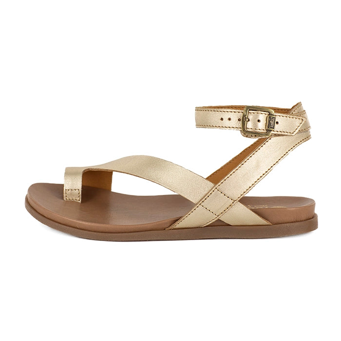 Gold sandal with an ankle strap and buckle on a white background
