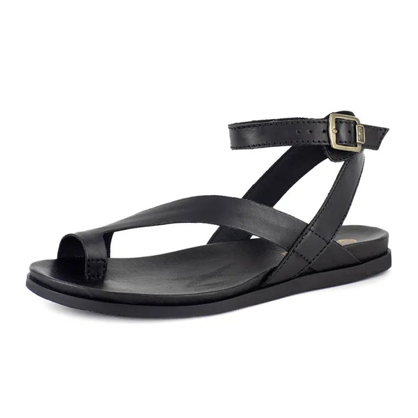 Black sandal with a ankle strap and buckle on a white background