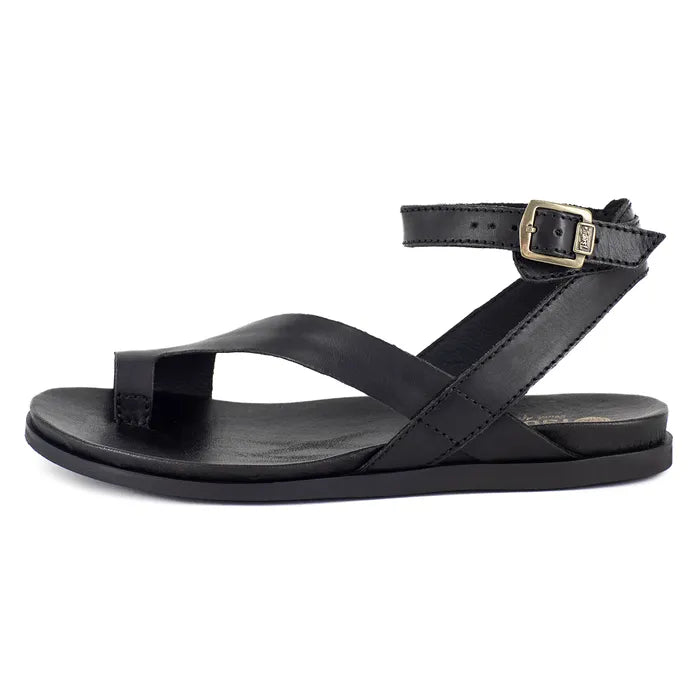 Black sandal with a gold buckle on a white background