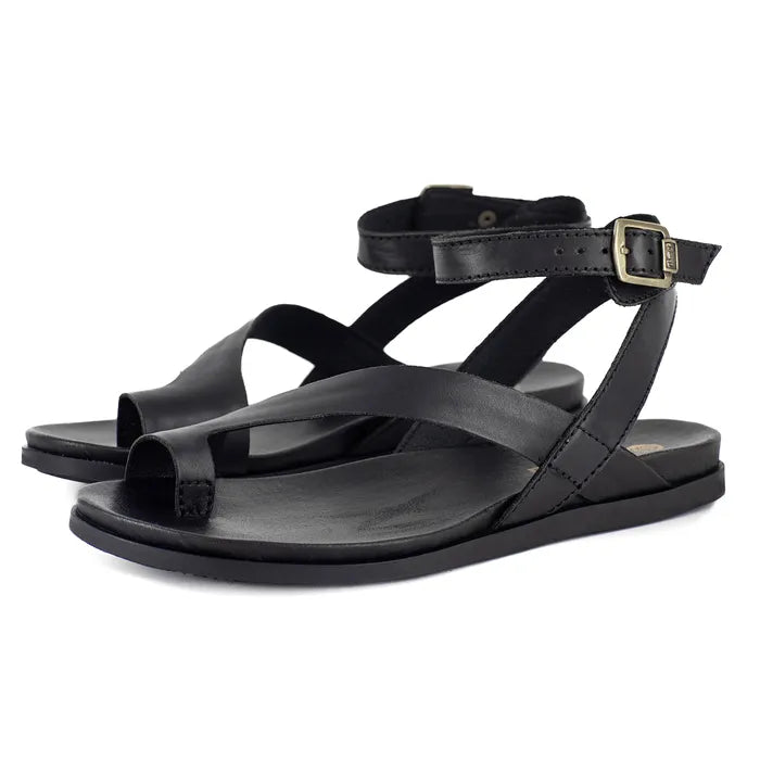 Black sandals with multiple straps on a white background