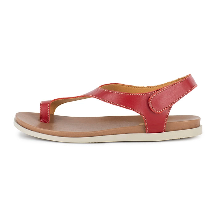 Red sandal with a white sole on a white background