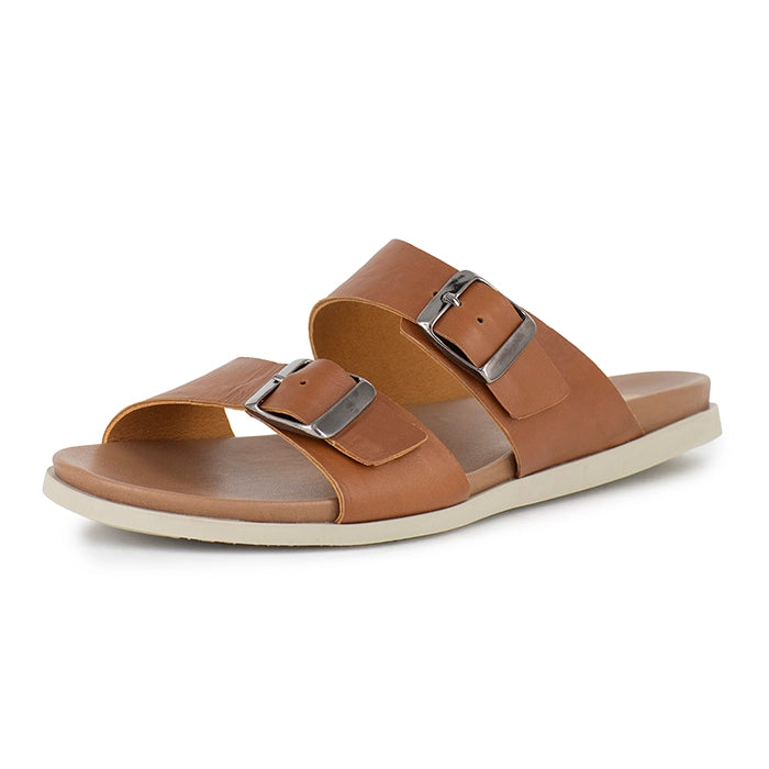 Brown sandal with silver buckles on a white background