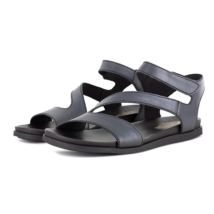 Pair of black metallic sandals on a white background