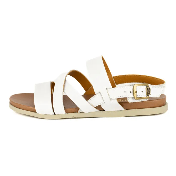White sandals with a brown sole on a white background