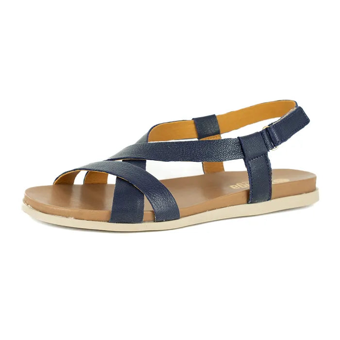 Navy sandal with a tan sole on a white background
