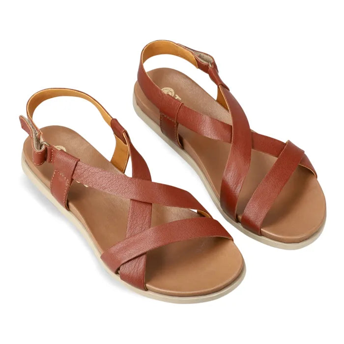 Brown sandals with multiple straps on a white background