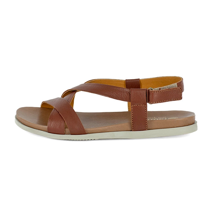 Brown sandal with a white sole on a white background