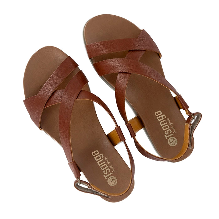 Brown sandals with braided straps on a white background
