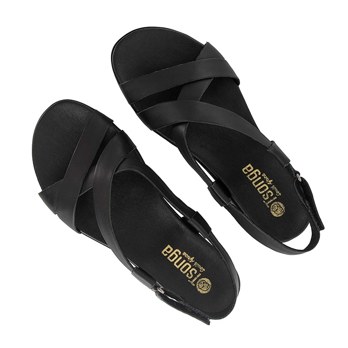 Black sandals with criss-cross straps on a white background