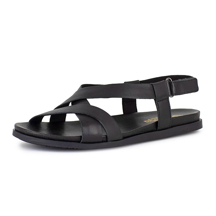Black sandal with multiple straps on a white background