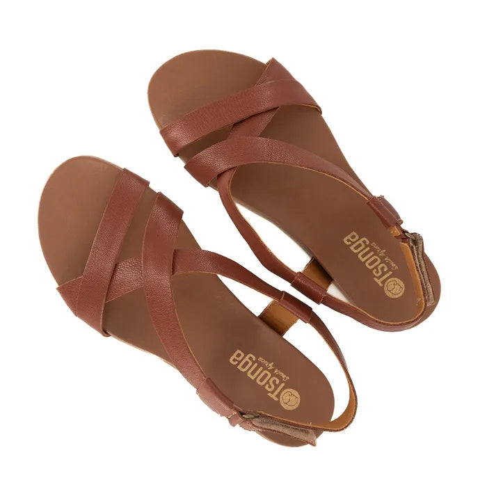 Pair of brown sandals with 'Tsonga' branding on a white background