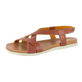 Brown sandal with a white sole on a white background
