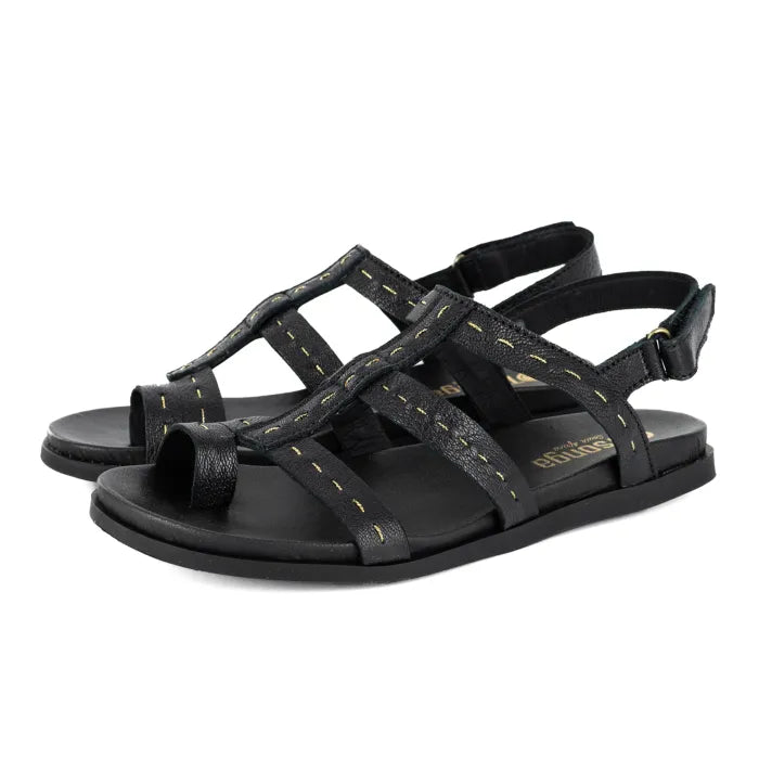 Black sandals with thin straps on a white background