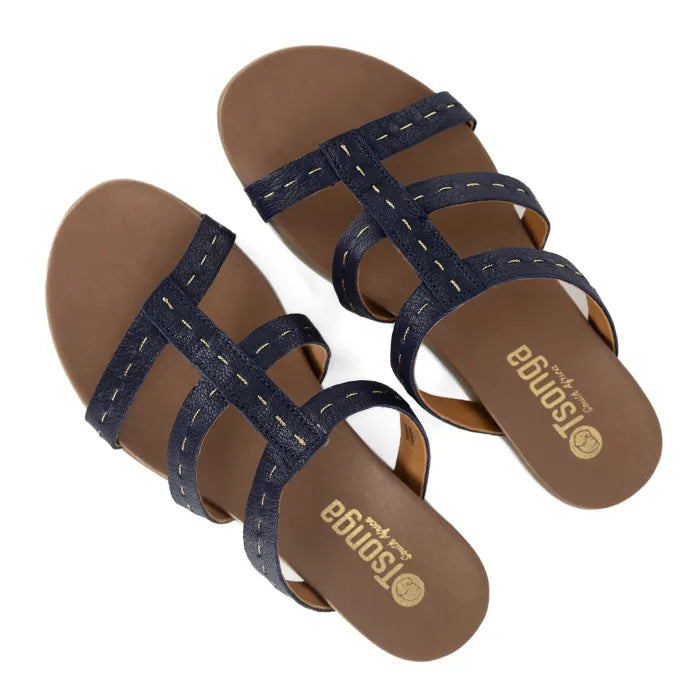 Pair of navy sandals with brown soles on a white background