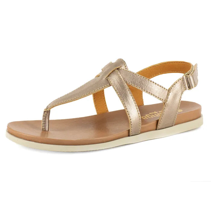 Gold sandal with thin straps on a white background