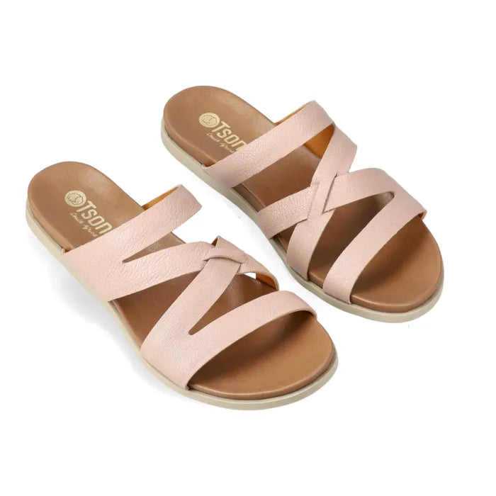Pink sandals with multiple straps on a white background
