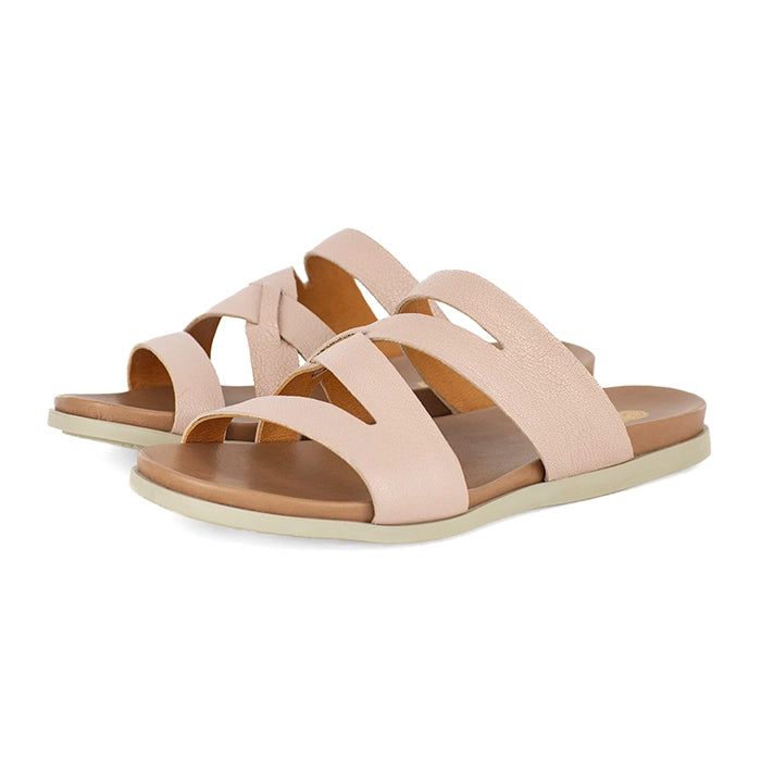 Pink sandals with multiple straps on a white background