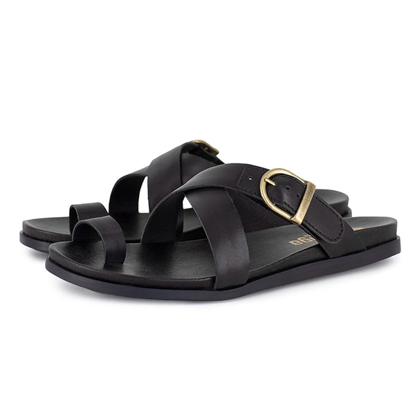 Black criss cross sandals with a gold buckle on a white background