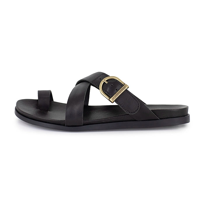 Black criss cross sandal with a gold buckle on a white background
